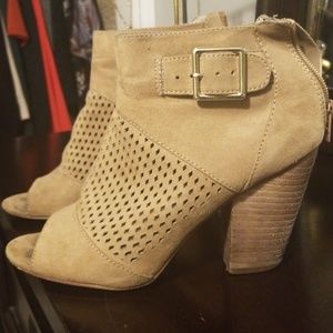 Cute tan colored wedge booties pumps. Size 6.5
